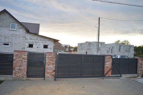 Відкотні ворота жалюзі з ламелей 4500х2000 720292514 фото