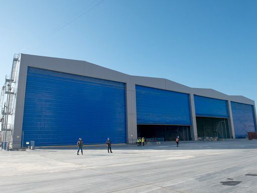 Ангарні моносекційні ворота DoorHan шторного типу 1101995028 фото