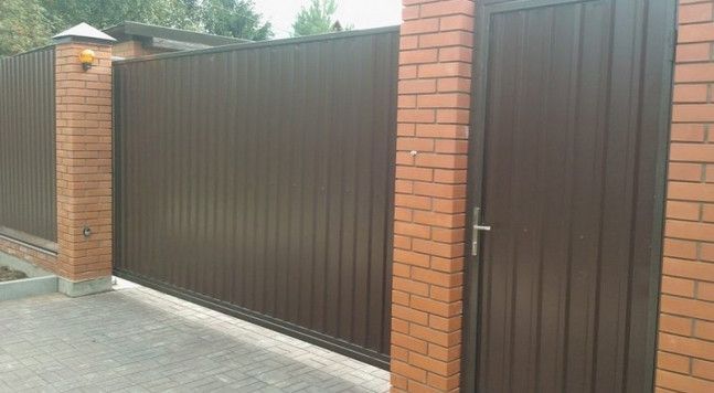 Відкотні ворота 4500х2000 заповнення профілісом 719308553 фото