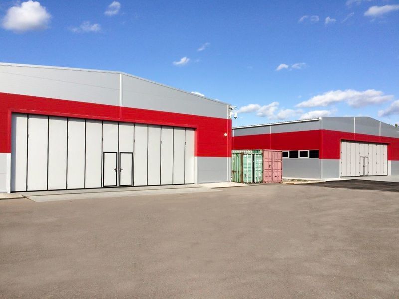 Промышленные складные ворота DoorHan IFG-LG с нижней направляющей 1095193848 фото