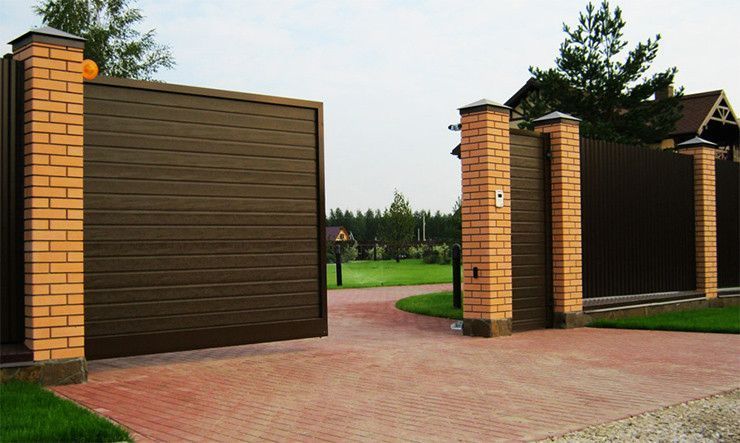 Відкотні ворота 4500х2000 заповнення сендвіч-панелями 720702456 фото